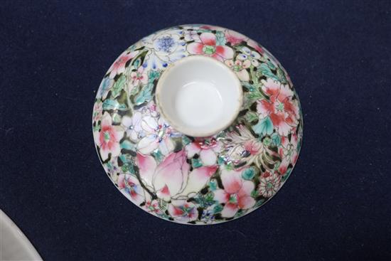 A Chinese ruby ground famille rose dish, early 20th century and a rice bowl, cover and stand